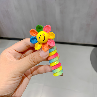 TwistBloom™ | Färgglada spiralformade hårsnoddar